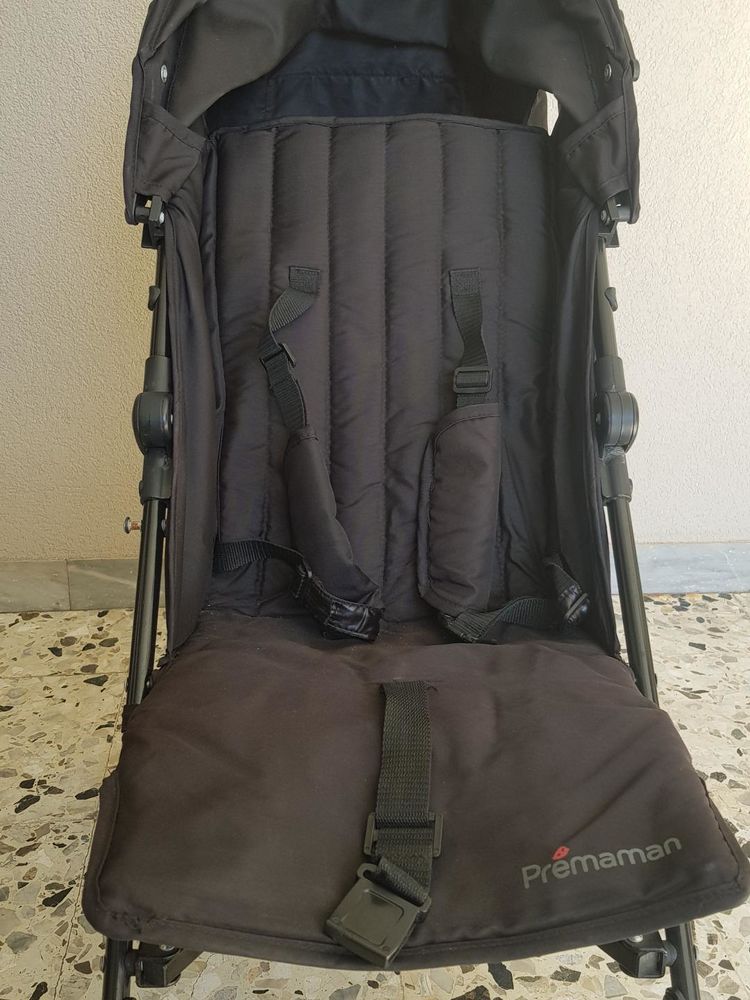 Poussette noire 
40 Saint-Rapha�l (83)