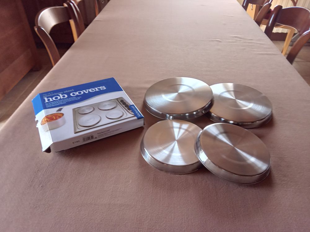 Jeu de 4 protections neuves pour plaques de cuisson. 10 Prendeignes (46)