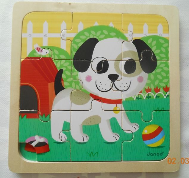 Puzzle bois 9 pi�ces petit chien JANOD 0 M�con (71)