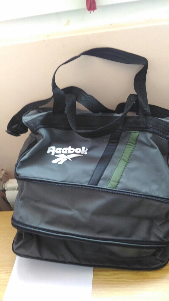 sac reebok gris