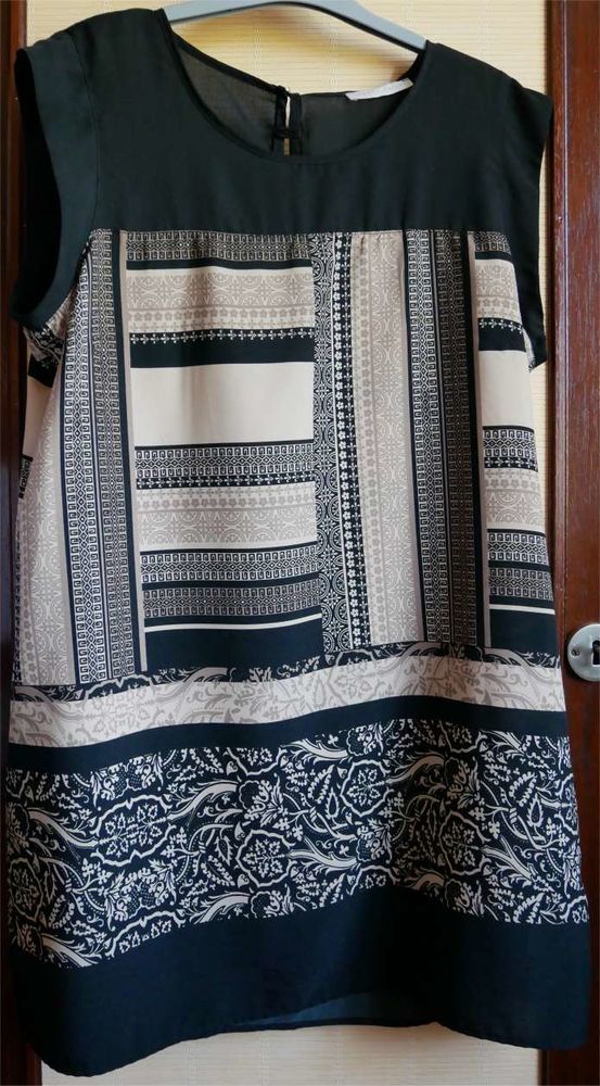 robe courte  noire beige 15 Saint-Germain-du-Plain (71)