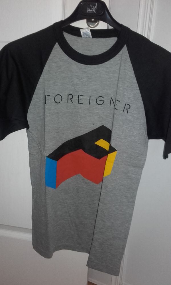 T-Shirt : Foreigner - Agent Provocateur 1985 (Grey/Black) - 220 Angers (49)