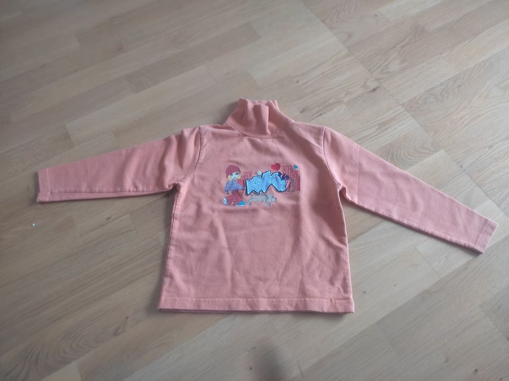 F 9 (21) - 6 ans ? Sous-pull orange  �Tissaia�  0 Paris 13 (75)