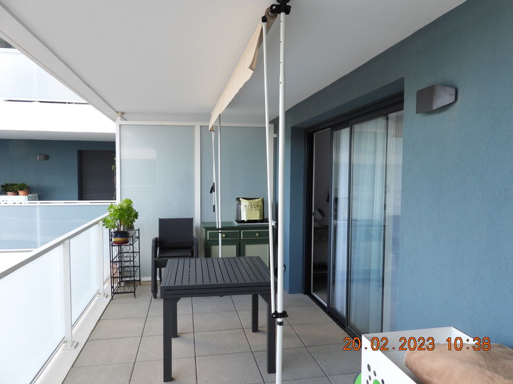 Store banne sans per�age. 120 Canet-en-Roussillon (66)