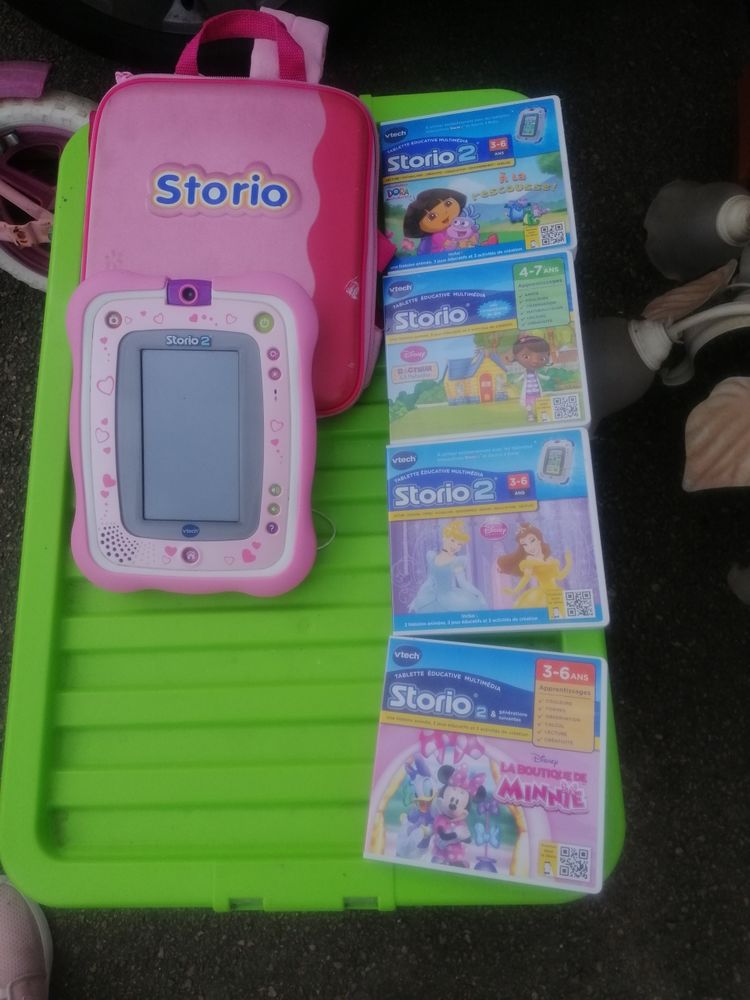 Storio 2 fille avec 4 jeux et sa pochette de rangement 50 Venizy (89)