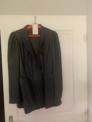 tailleur cuir 
I 40 Vitry-le-Fran�ois (51)