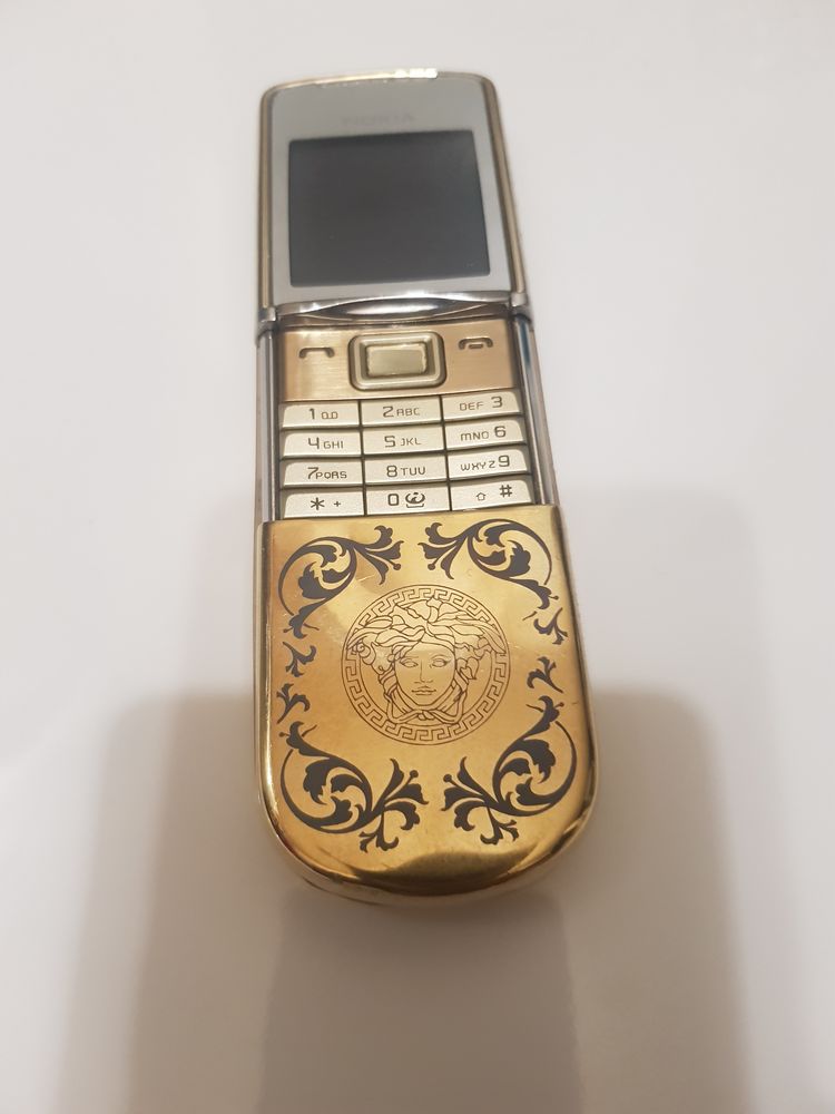 Téléphone gold Sirocco  versace 300 Nanterre (92)