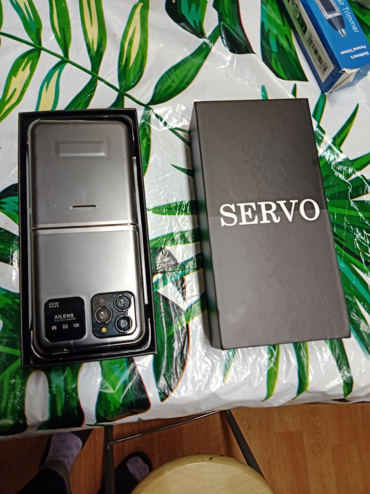 T�l�phone portable pliable servo 25 Voiron (38)