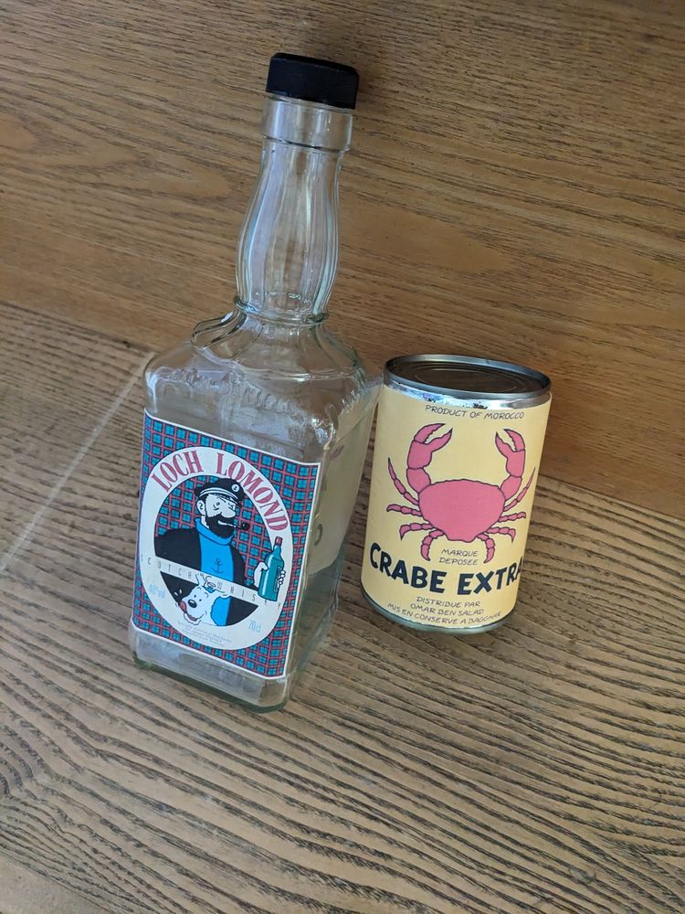 tintin et Milou bo�te de conserve ouverte + bouteille du cap 10 Marseille 13 (13)