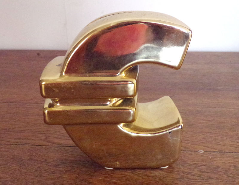 une tirelire en métal doré en forme d' euro 3 Laval (53)