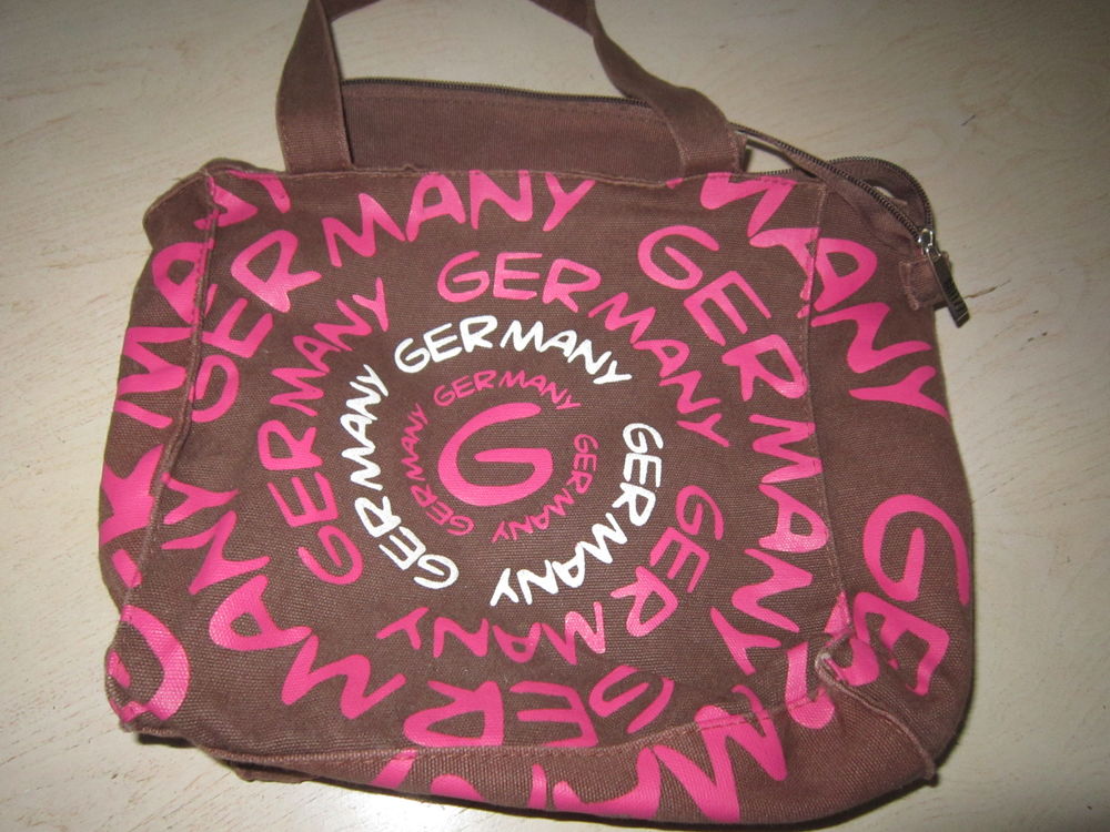 Un sac en tissu couleur marron soutenu et rose
5 Brignais (69)