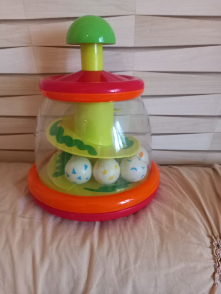 Toupie multicolore marque Tmimi 0 � 3 ans 5 Villiers (86)