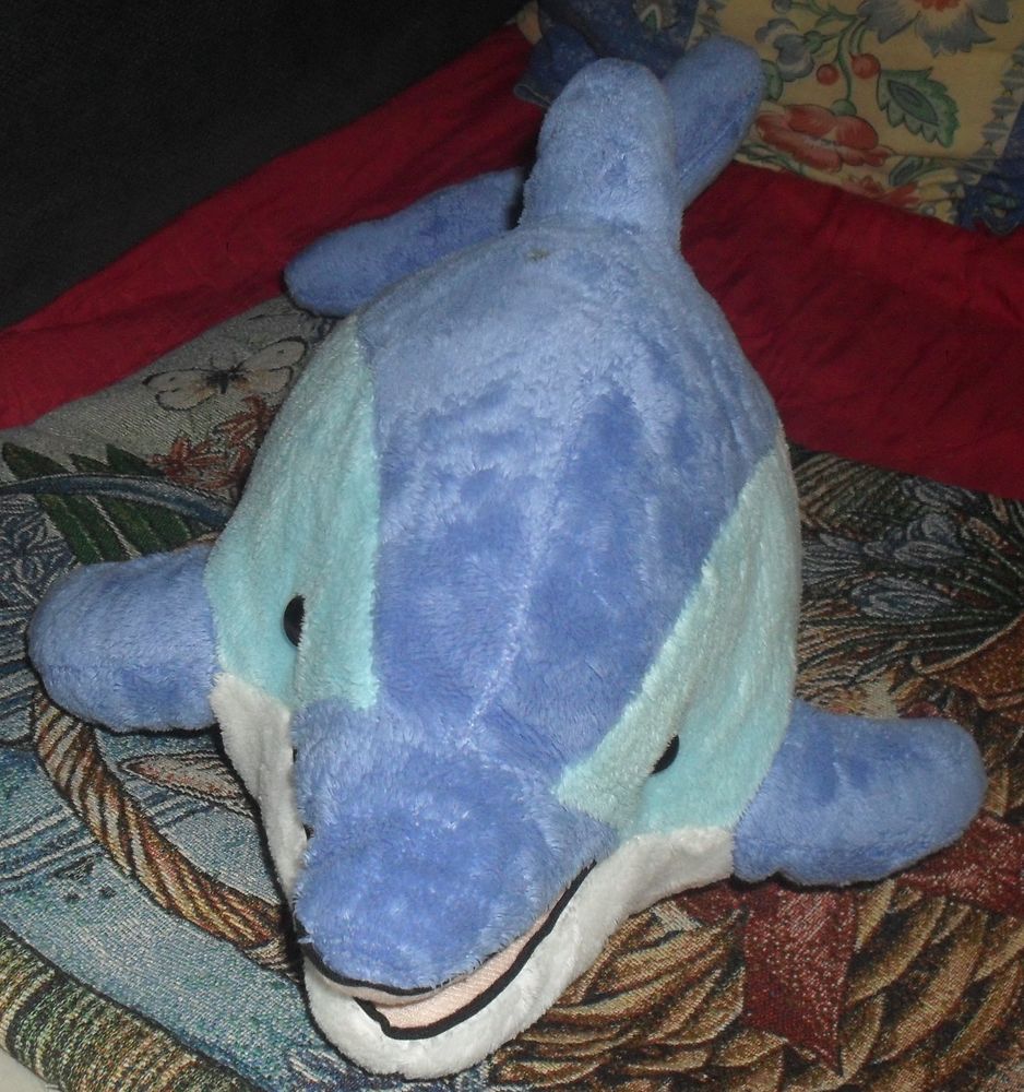 Tr�s jolie peluche Dauphin
Longueur 46cm. 20 Montreuil (93)