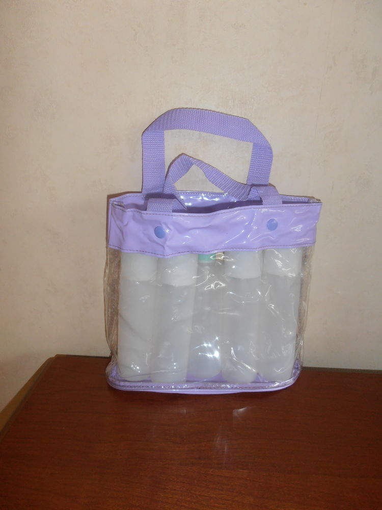 Trousse + vaporisateurs (54) 10 Tours (37)