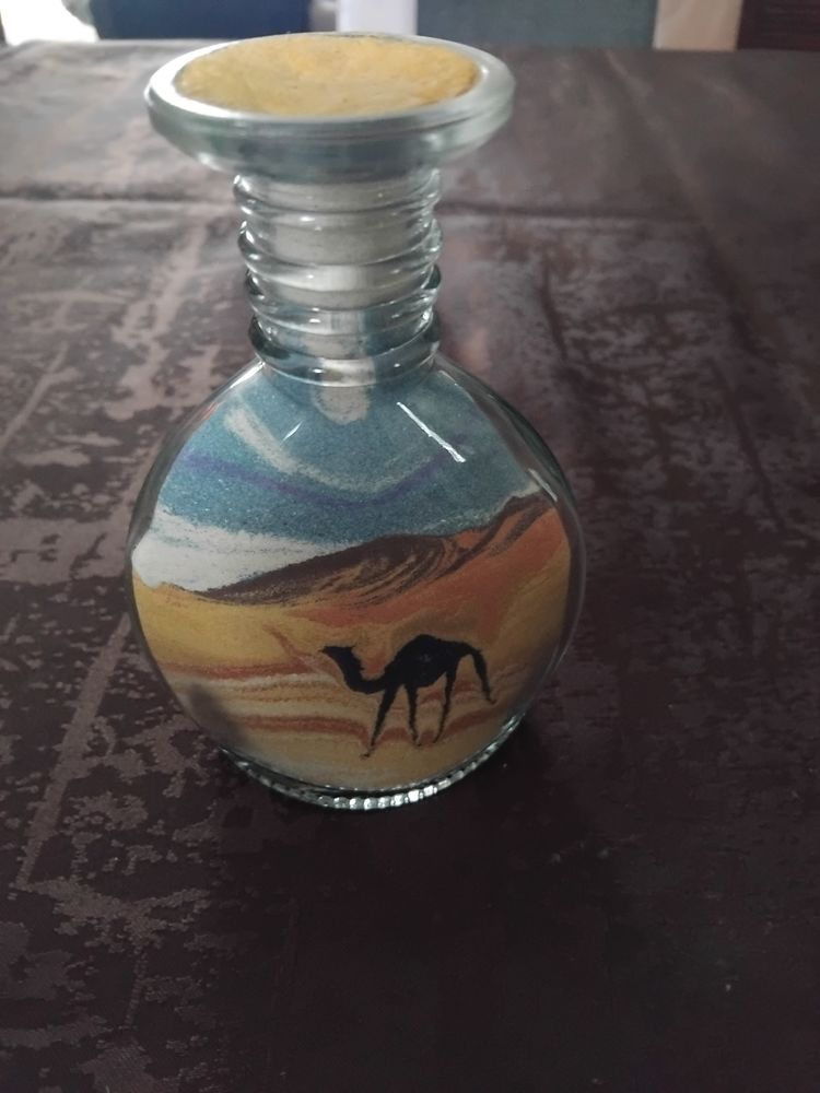 Vase contenant du sable 1 Belleville (69)