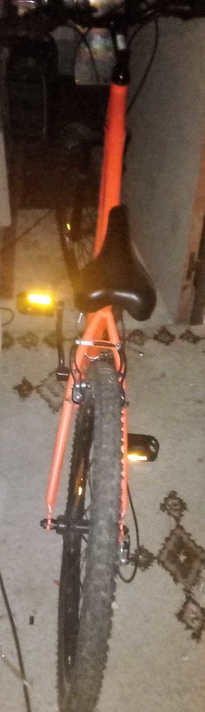 v�lo orange. enfant 10 ) 12 ans 140 Lampertheim (67)