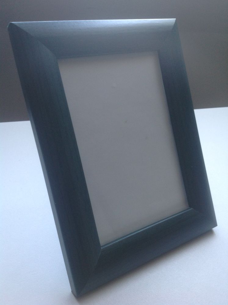 VERRE ET ENCADREMENT BOIS VERT AVEC SUPPORT Envoi Possible
2 Tr�gunc (29)