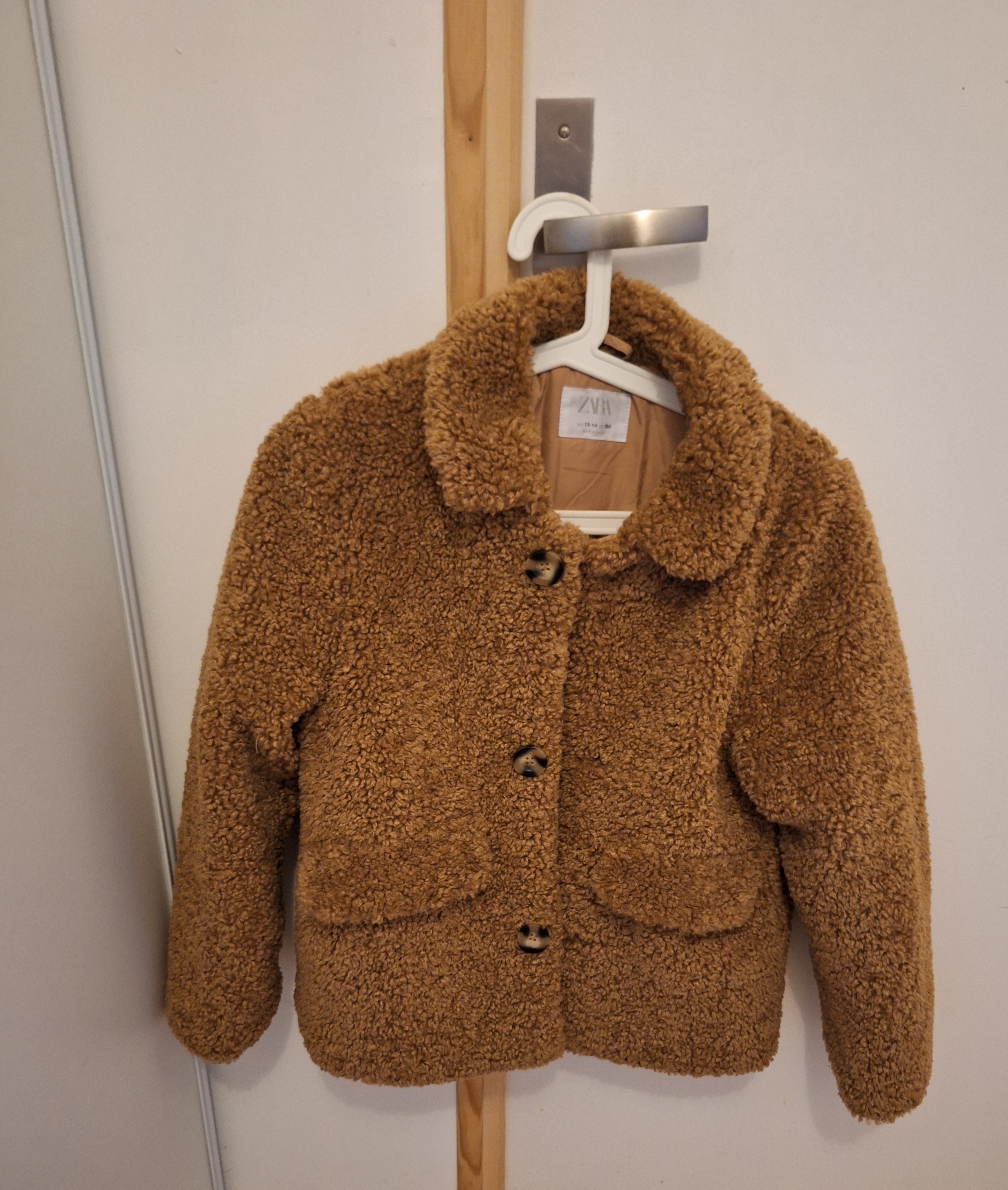 Veste chaude aspect bouclettes mouton, doubl�e tissu soyeux. 14 Saint-Pol-de-L�on (29)