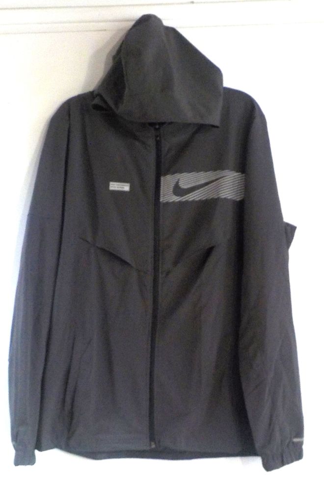VESTE DE JOGGING A CAPUCHE GRIS FONCE NIKE DRI-FIT TAILLE L 30 Bubry (56)