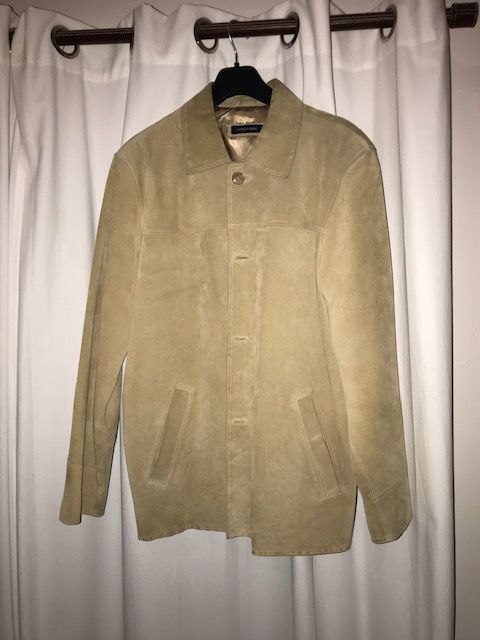 Veste en peau couleur beige taille 54 35 Versailles (78)