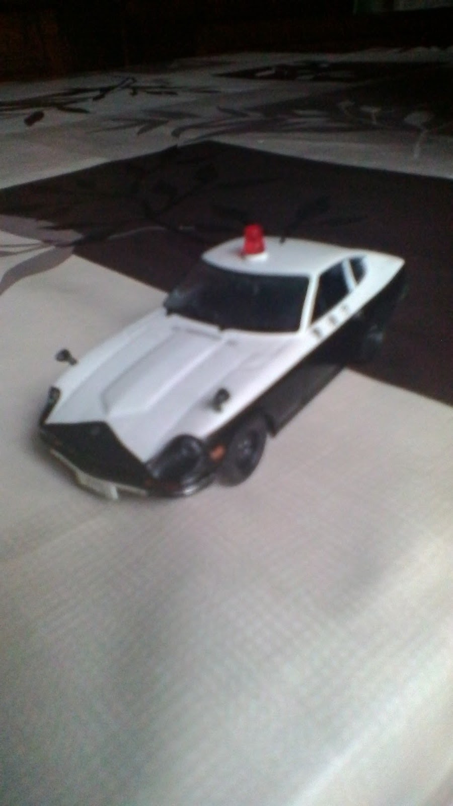 Voiture miniature datsun 240Z de la police 15 Avermes (03)