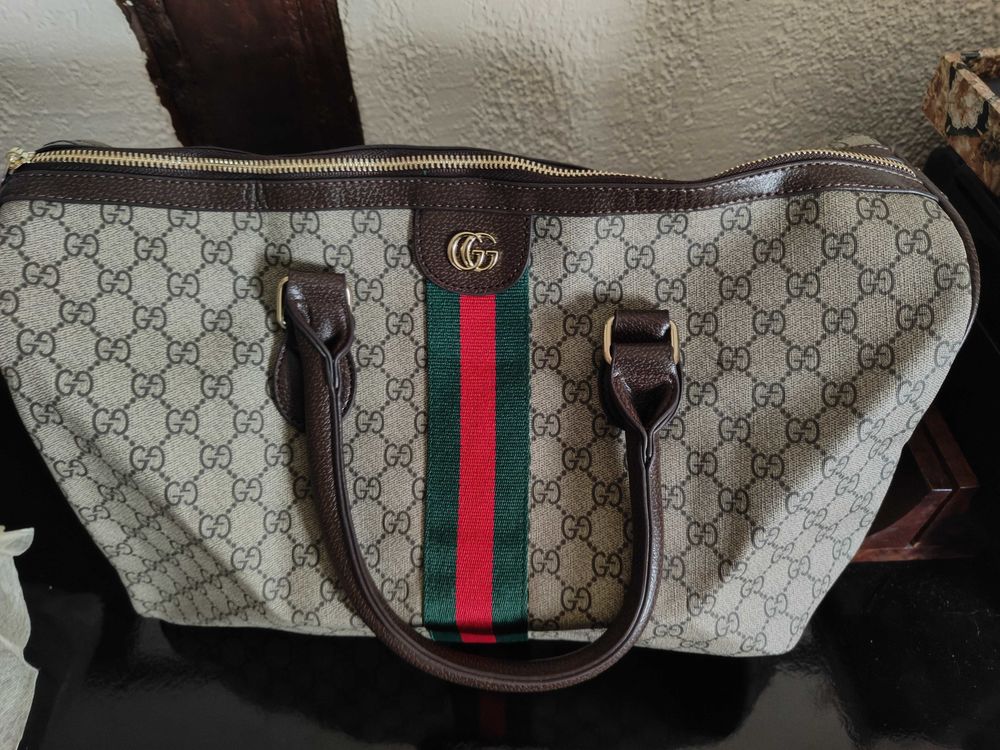 sac de voyage Gucci d'occasion mais en parfait �tat. 120 Gisors (27)