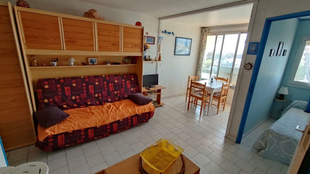 Le Cap d'Agde - Secteur FALAISES, Appartement 2 pièces + loggia vitrée. Résidence avec ascenseur, piscine. Parking privatif.