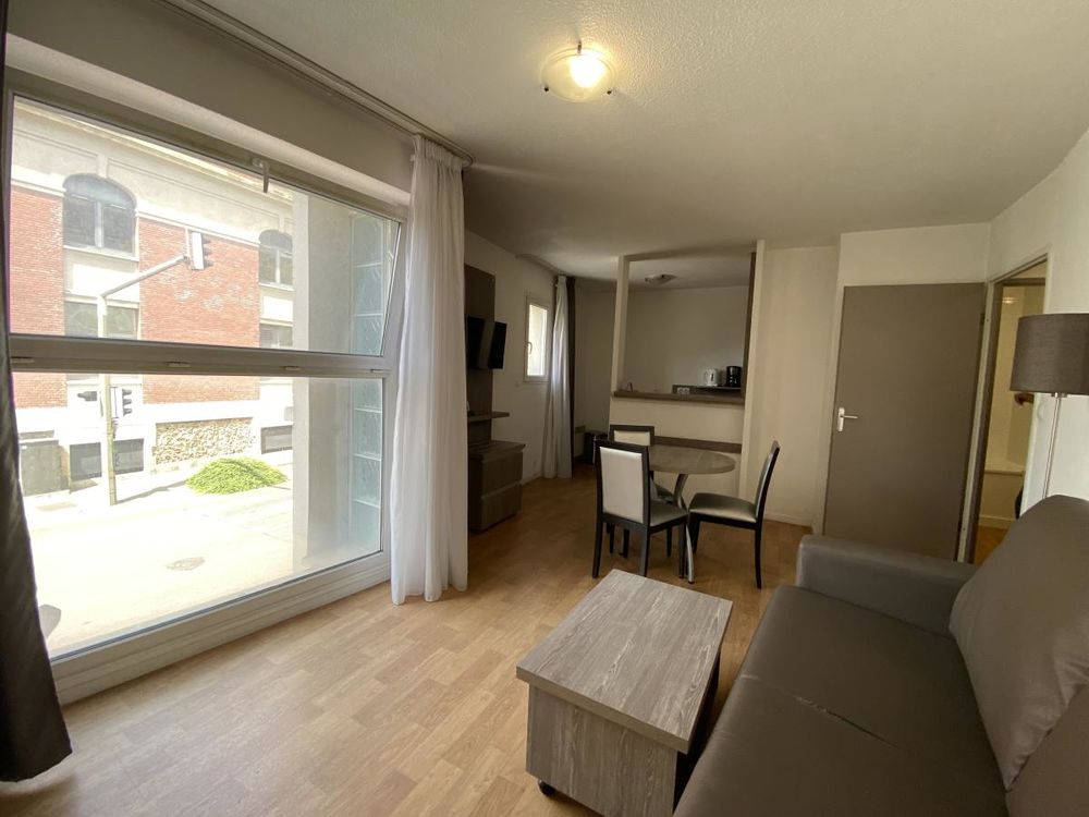 7 appartements (3 studios, 2 T1 et 2 T2) + 4 parkings