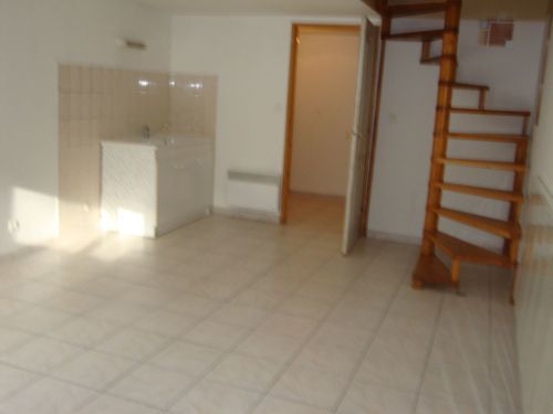 Duplex T3 avec petite cour fermée