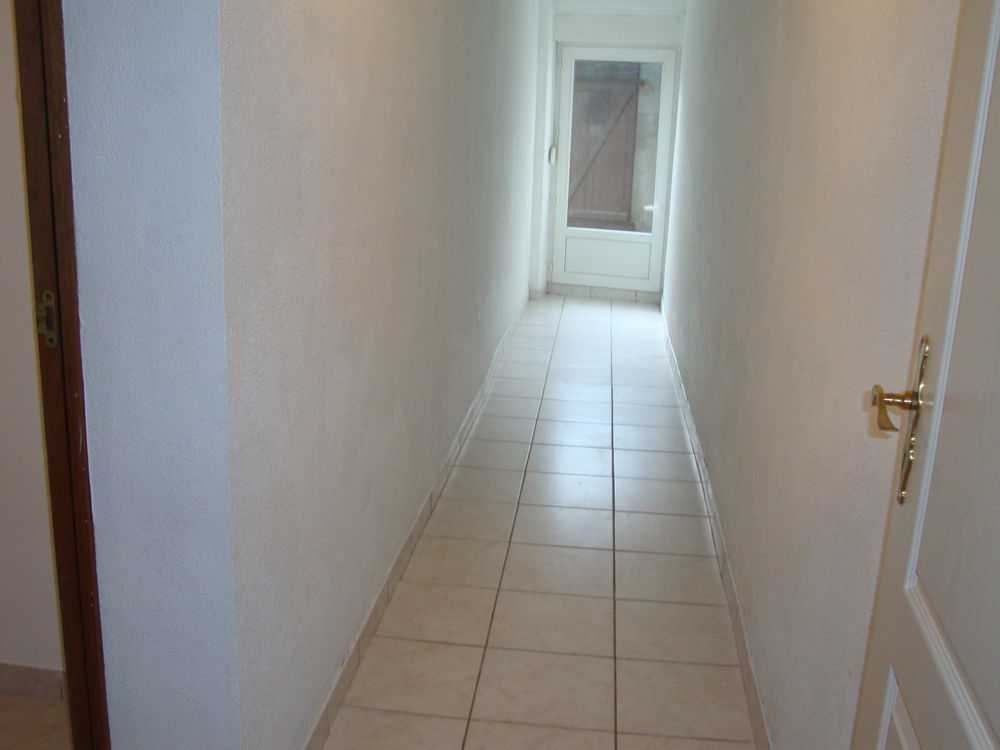 Duplex T3 avec petite cour fermée