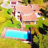 Maison architecte 250m². Jardin 2700m². Garage. Piscine