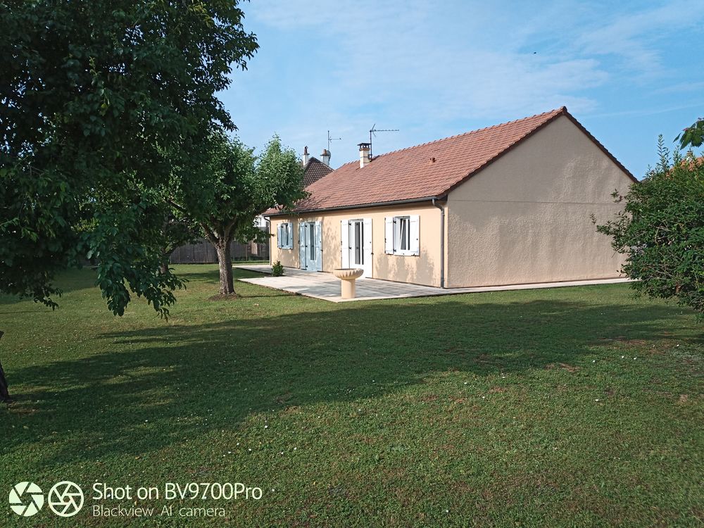 maison + un terrain attenant