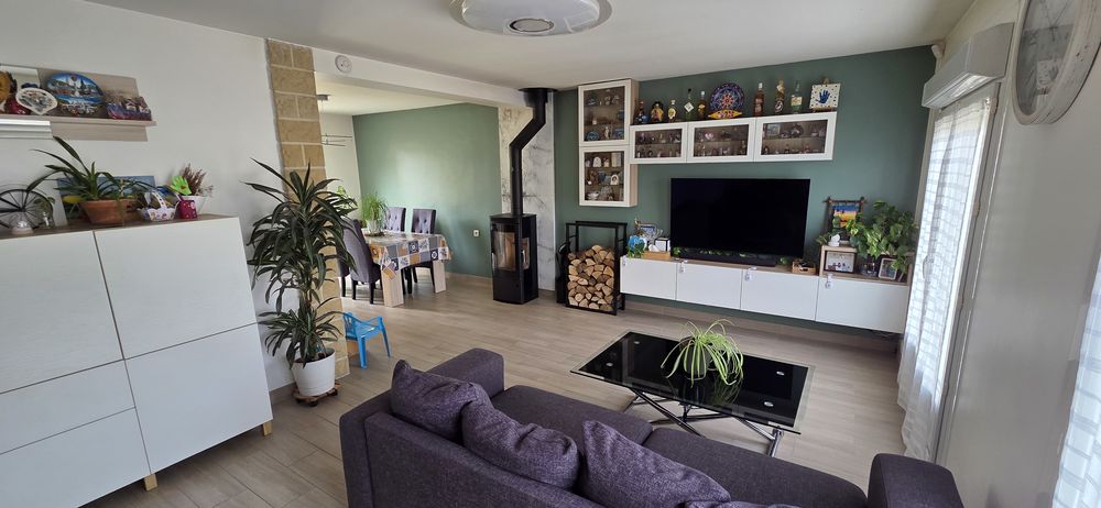 Maison lumineuse de 122 m² avec grand jardin et panneaux sol
