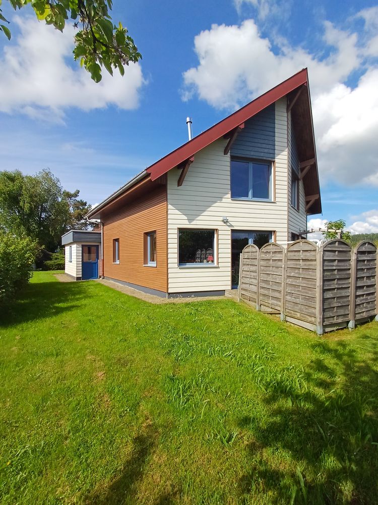 Maison 4 façades sur un terrain de 795m2 aménagé