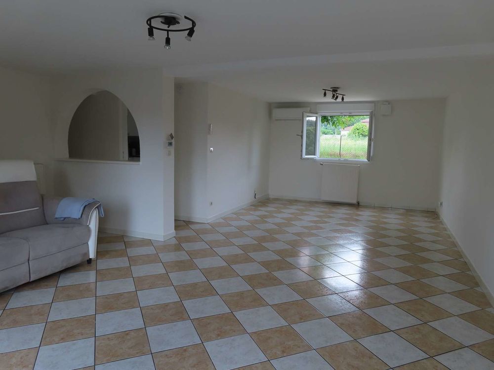 Appartement en rez de jardin de 85m² / garage attenant