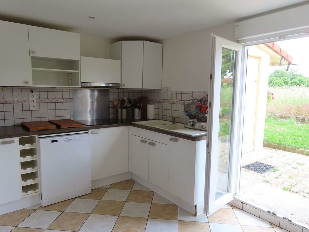 Appartement en rez de jardin de 85m² / garage attenant