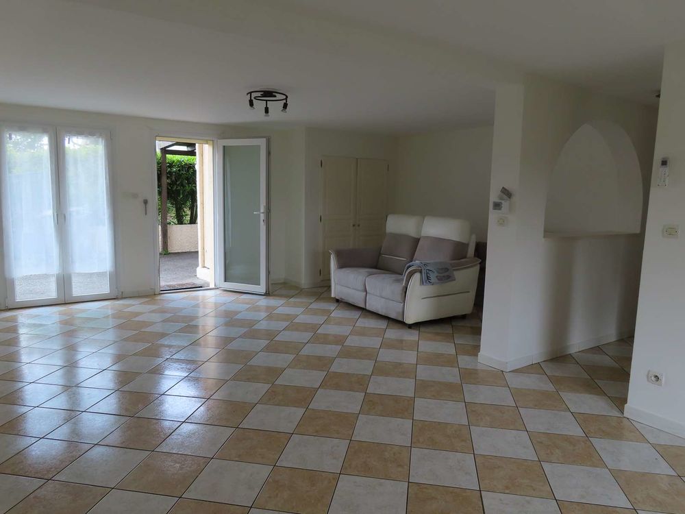 Appartement en rez de jardin de 85m² / garage attenant
