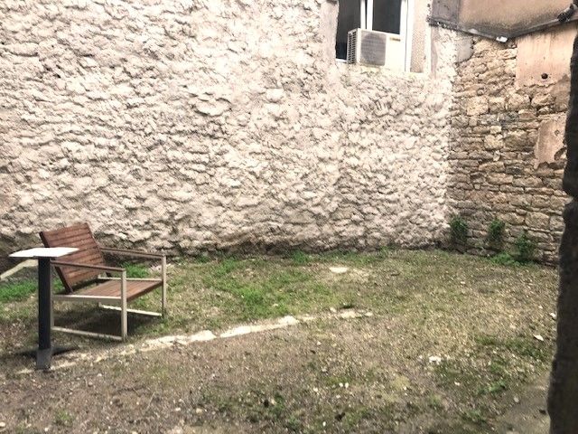 Appartement F1 bis avec jardin privatif de 32 m²
