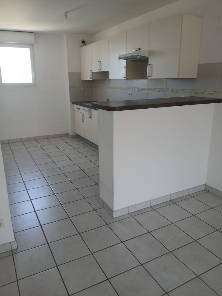 Perpignan-Clos Banet-Grd app.F3-1.ét.+Terrasse+Parking fermé