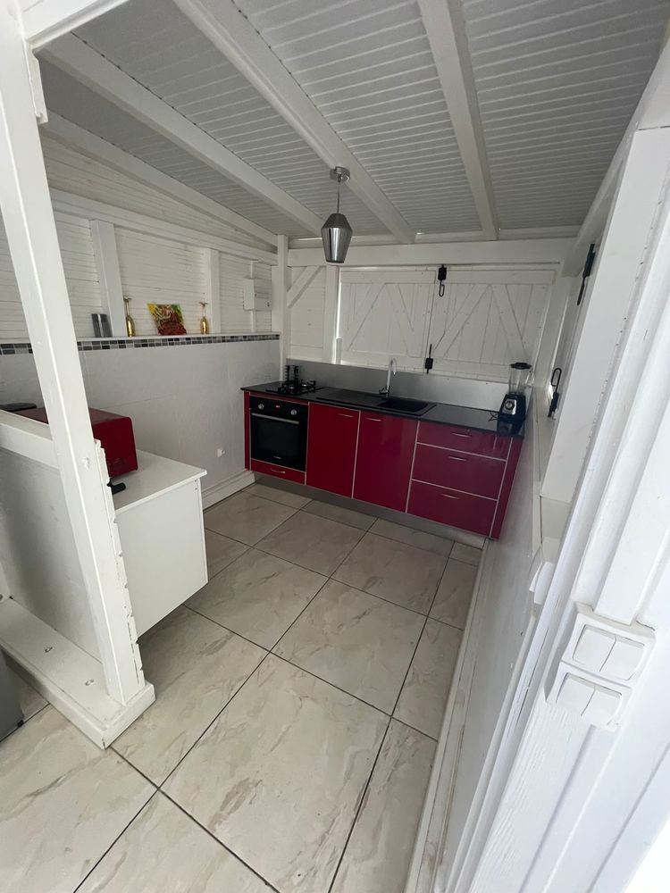 une maison dans uns residence fleurie a GOYAVE