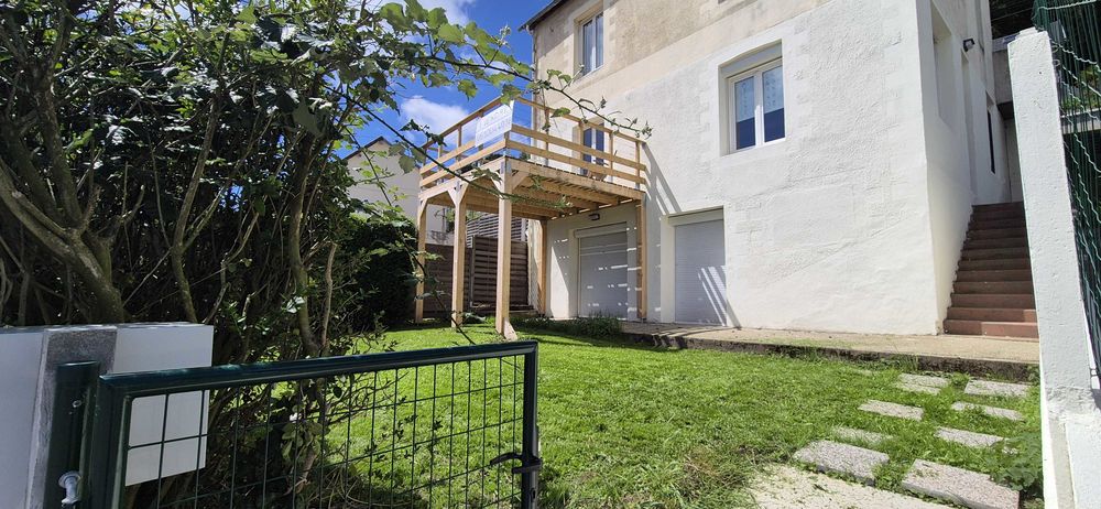 appartement f5 atypique avec jardin et terrasse