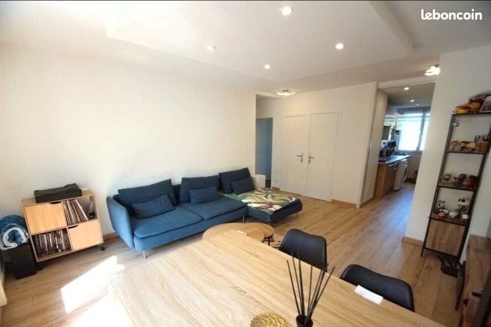 T3 rénové 63 m² avec balcon, parking privé, cave, clim, ascenseur