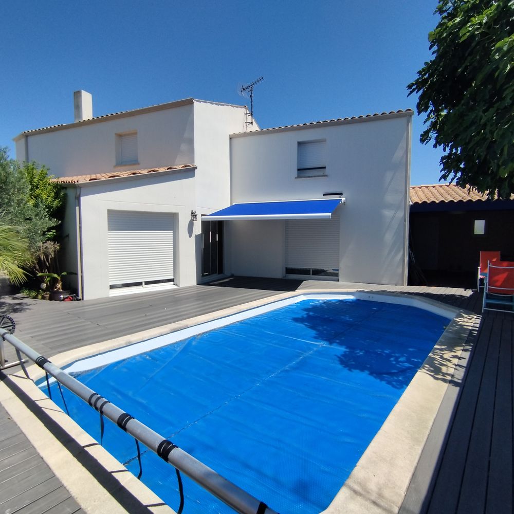 Maison 5 chambres + 1 bureau.+ Piscine garage.