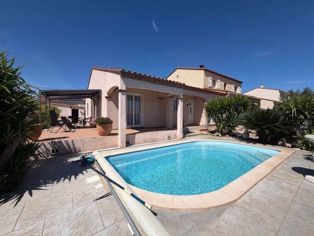 Maison de plein pied piscine jardin