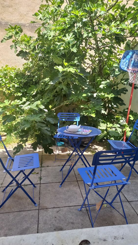 Maison de ville avec jardin et place de parking