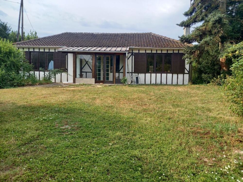 Maison sur terrain + étang
