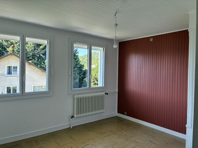 Maison jumelée avec jardin et garage