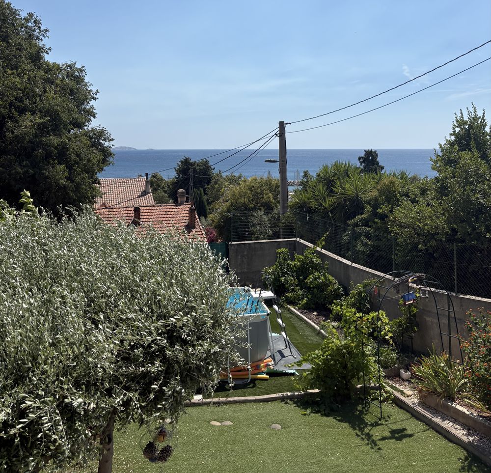 de 2 villas mitoyennes (2 T4 de 78 m2 sur 2 garages)