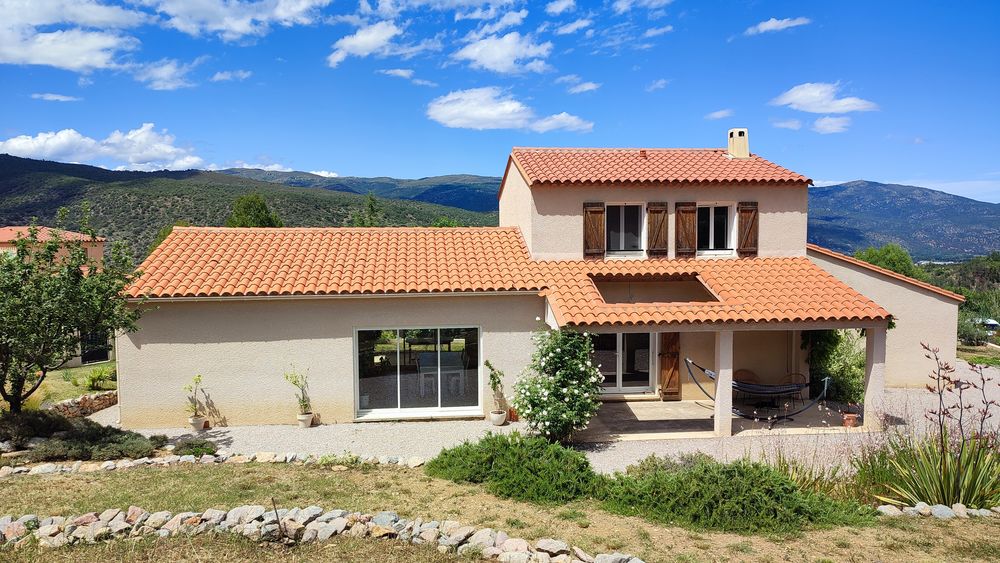 Maison 4 faces sur 1600 m2 - Ria-Sirach