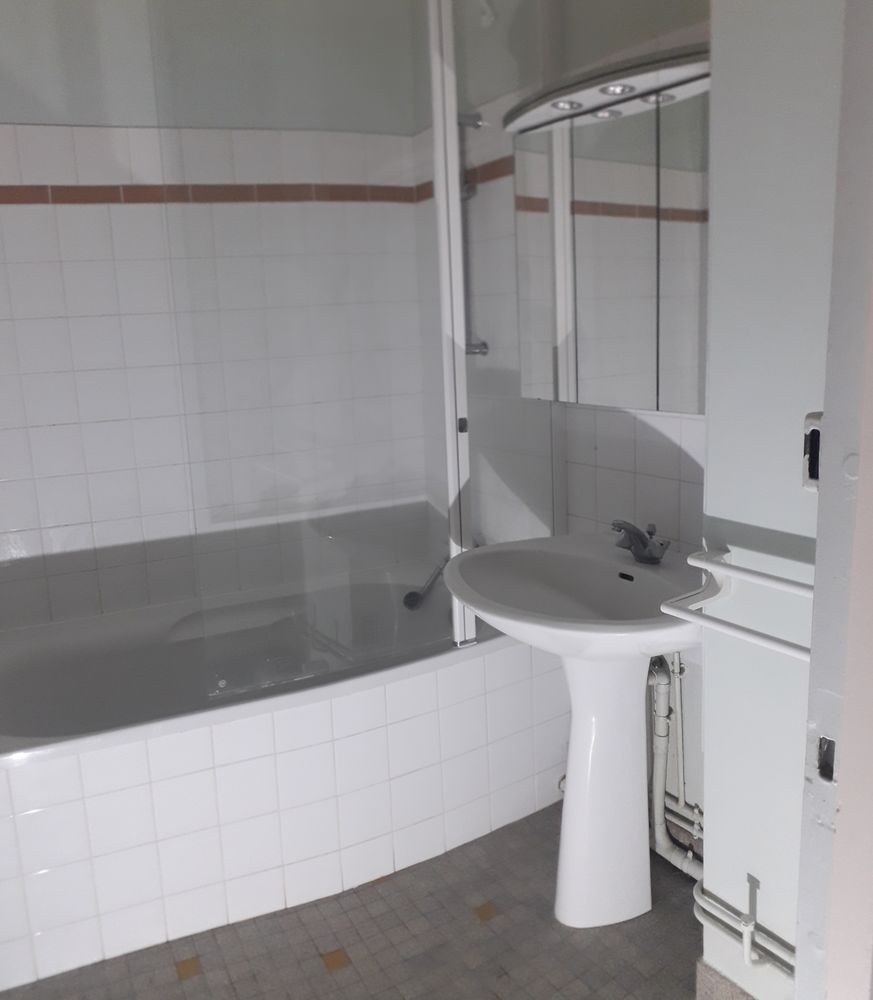 Appartement 70 m² / Garage / Jardin commun